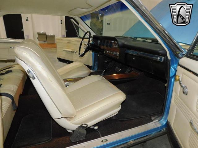 Photo of 1967 Blue and White Pontiac GTO