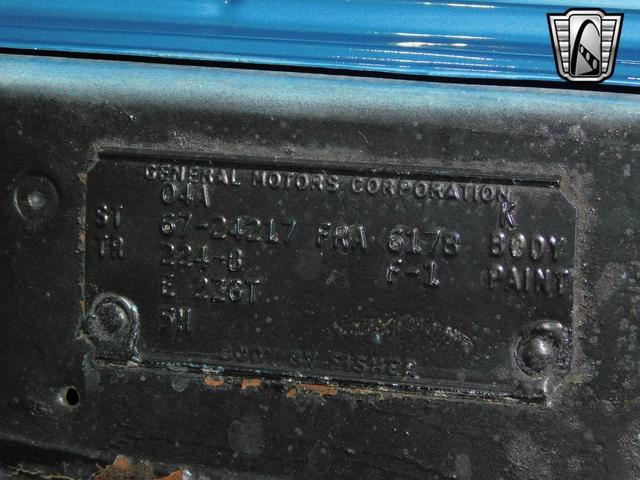Photo of 1967 Blue and White Pontiac GTO
