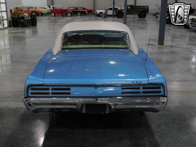Photo of 1967 Blue and White Pontiac GTO