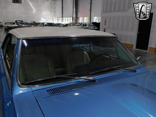 Photo of 1967 Blue and White Pontiac GTO