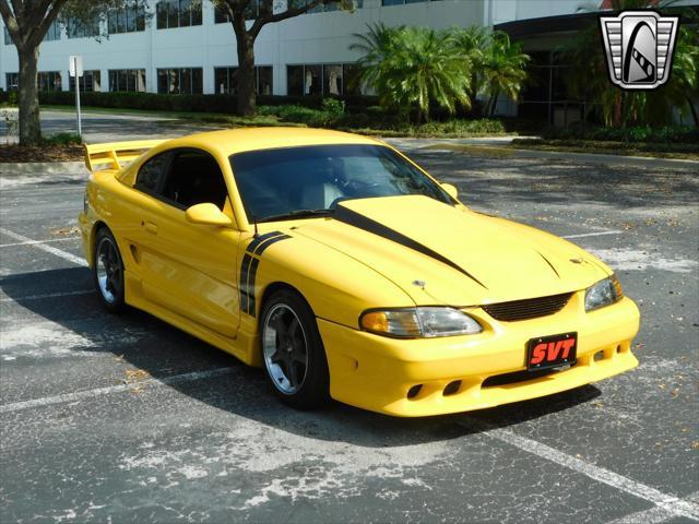 Photo of 1995 Yellow Ford Mustang