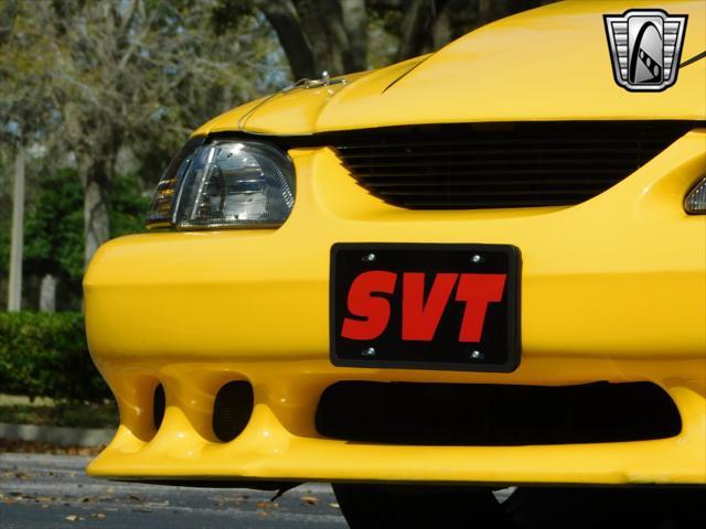 Photo of 1995 Yellow Ford Mustang