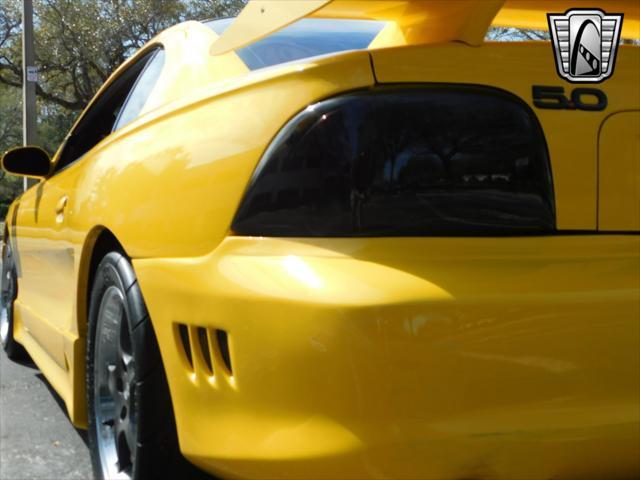Photo of 1995 Yellow Ford Mustang