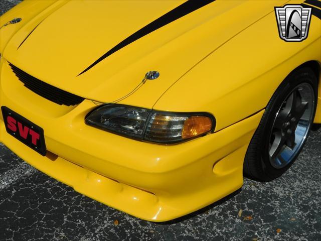 Photo of 1995 Yellow Ford Mustang