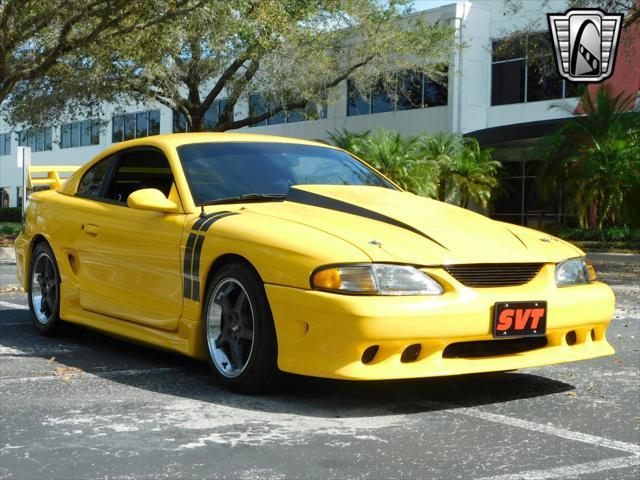 Photo of 1995 Yellow Ford Mustang