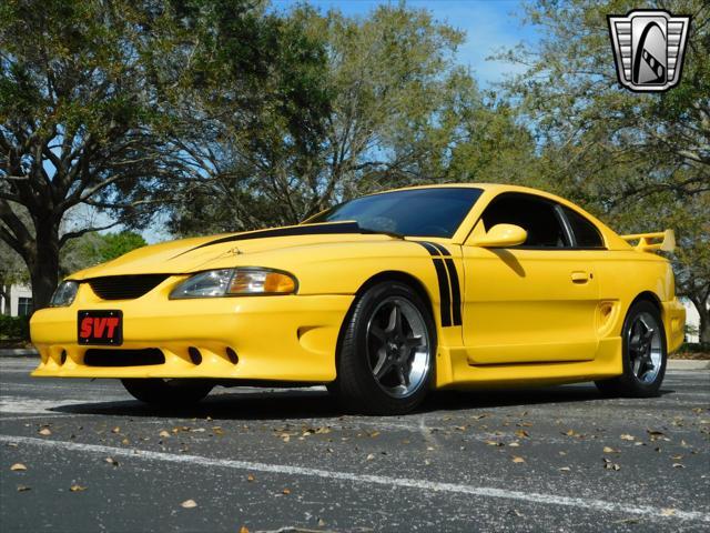 Photo of 1995 Yellow Ford Mustang