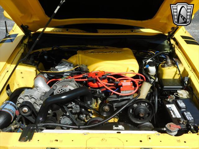 Photo of 1995 Yellow Ford Mustang