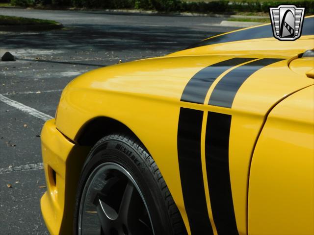 Photo of 1995 Yellow Ford Mustang