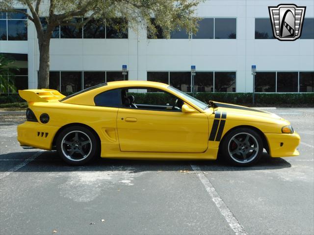 Photo of 1995 Yellow Ford Mustang