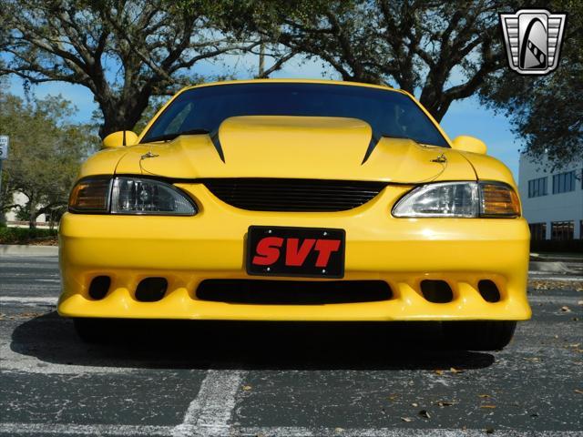 Photo of 1995 Yellow Ford Mustang