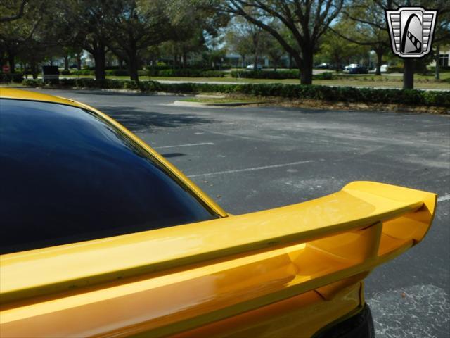 Photo of 1995 Yellow Ford Mustang