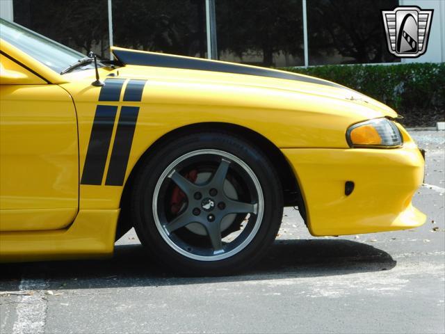 Photo of 1995 Yellow Ford Mustang