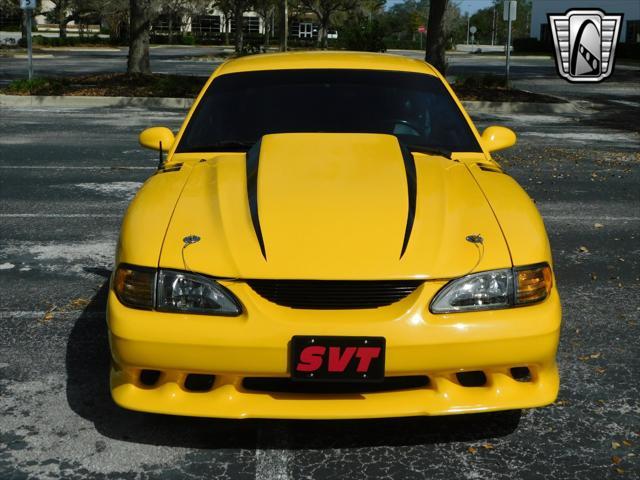 Photo of 1995 Yellow Ford Mustang