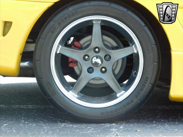 Photo of 1995 Yellow Ford Mustang