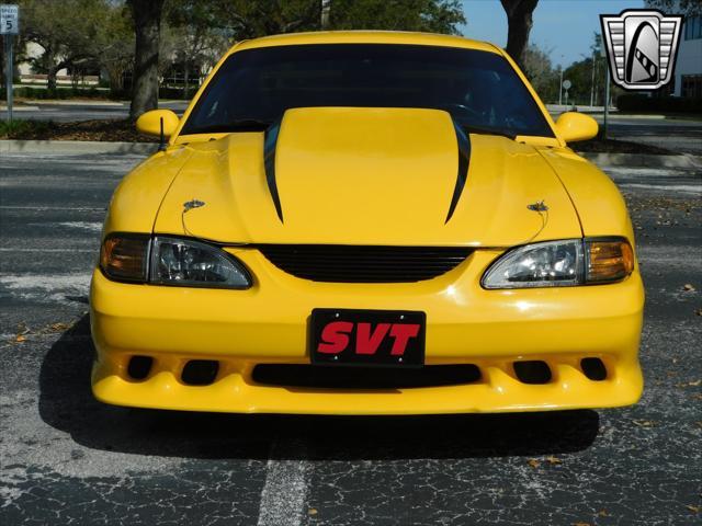 Photo of 1995 Yellow Ford Mustang