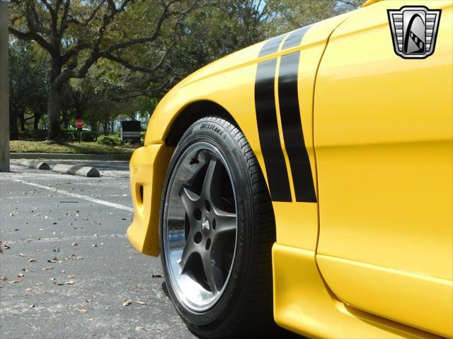 Photo of 1995 Yellow Ford Mustang
