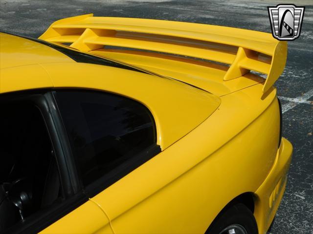 Photo of 1995 Yellow Ford Mustang
