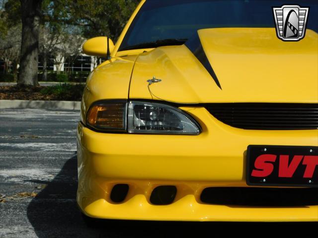 Photo of 1995 Yellow Ford Mustang