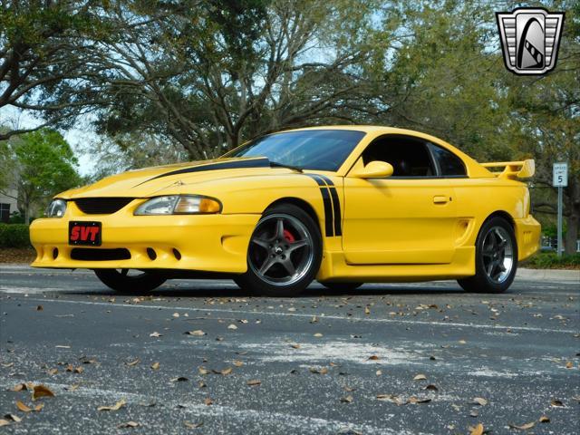 Photo of 1995 Yellow Ford Mustang