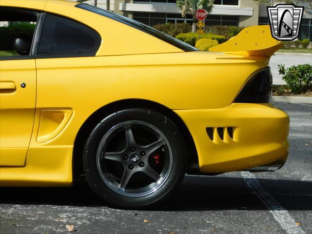 Photo of 1995 Yellow Ford Mustang