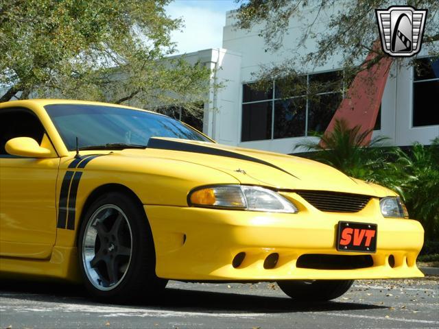 Photo of 1995 Yellow Ford Mustang