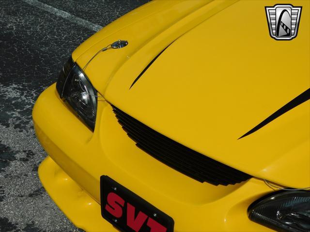 Photo of 1995 Yellow Ford Mustang