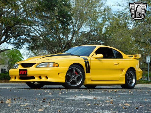 Photo of 1995 Yellow Ford Mustang