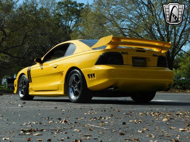 Photo of 1995 Yellow Ford Mustang