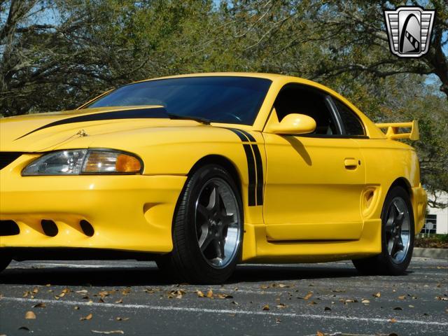 Photo of 1995 Yellow Ford Mustang