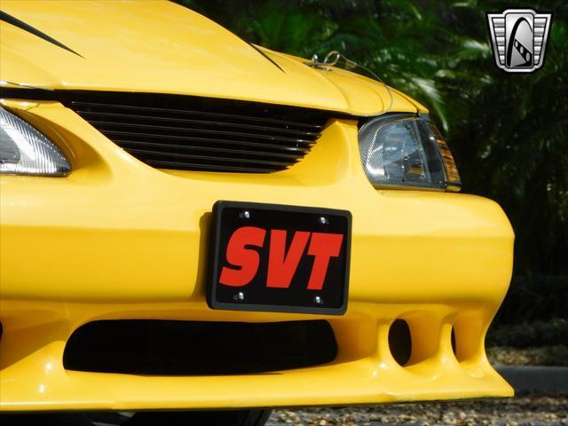 Photo of 1995 Yellow Ford Mustang