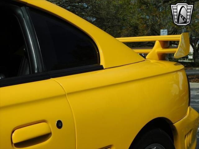 Photo of 1995 Yellow Ford Mustang