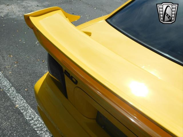 Photo of 1995 Yellow Ford Mustang