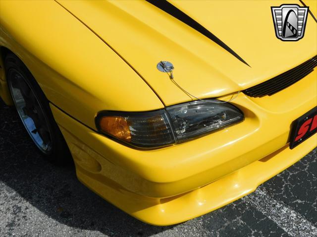 Photo of 1995 Yellow Ford Mustang