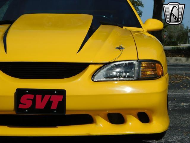 Photo of 1995 Yellow Ford Mustang
