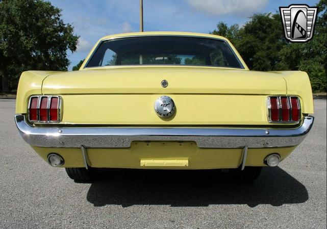 Photo of 1966 Yellow Ford Mustang