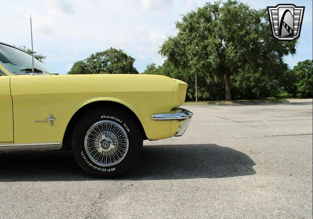 Photo of 1966 Yellow Ford Mustang