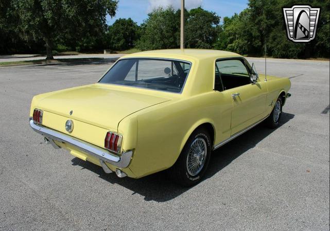 Photo of 1966 Yellow Ford Mustang