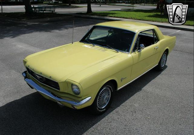 Photo of 1966 Yellow Ford Mustang