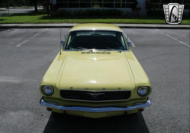 Photo of 1966 Yellow Ford Mustang