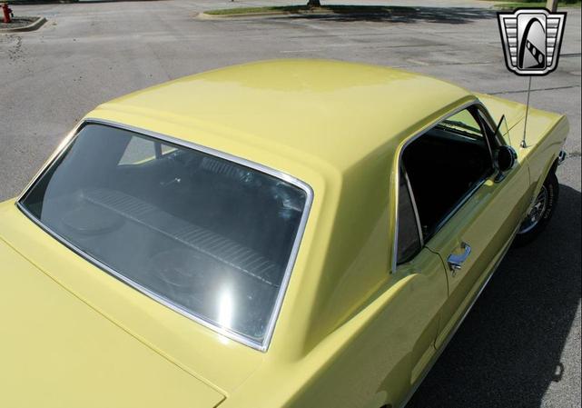 Photo of 1966 Yellow Ford Mustang