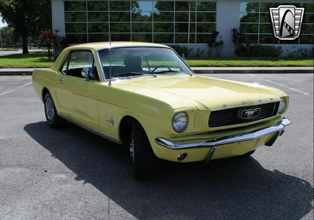 Photo of 1966 Yellow Ford Mustang