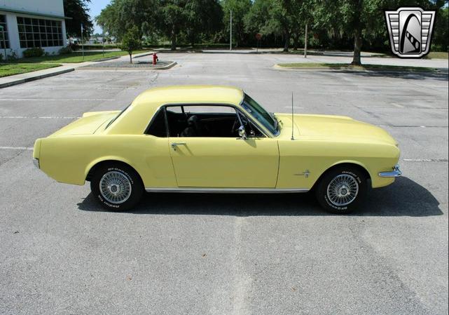 Photo of 1966 Yellow Ford Mustang