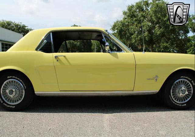 Photo of 1966 Yellow Ford Mustang