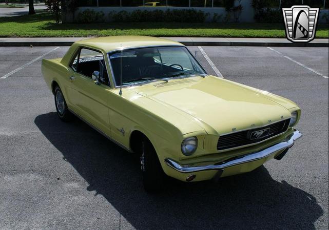 Photo of 1966 Yellow Ford Mustang