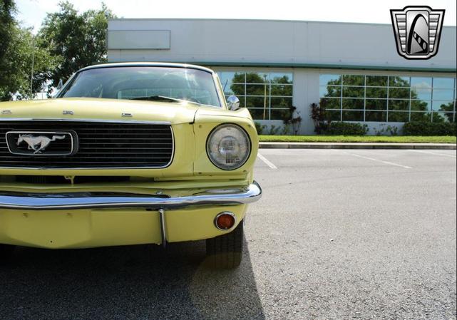 Photo of 1966 Yellow Ford Mustang