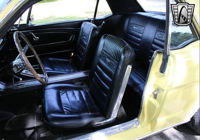 Photo of 1966 Yellow Ford Mustang
