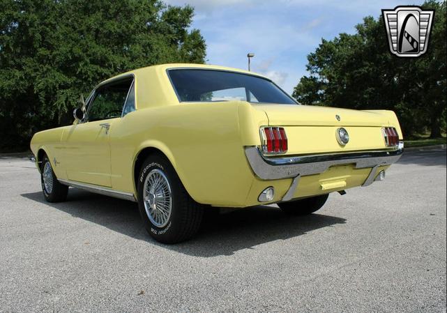 Photo of 1966 Yellow Ford Mustang
