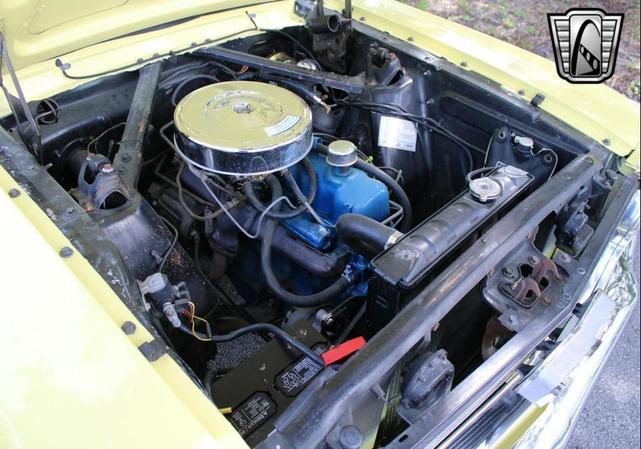 Photo of 1966 Yellow Ford Mustang