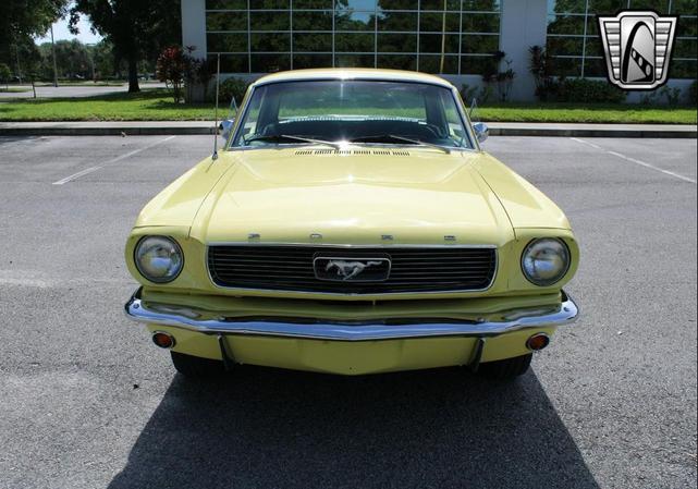 Photo of 1966 Yellow Ford Mustang