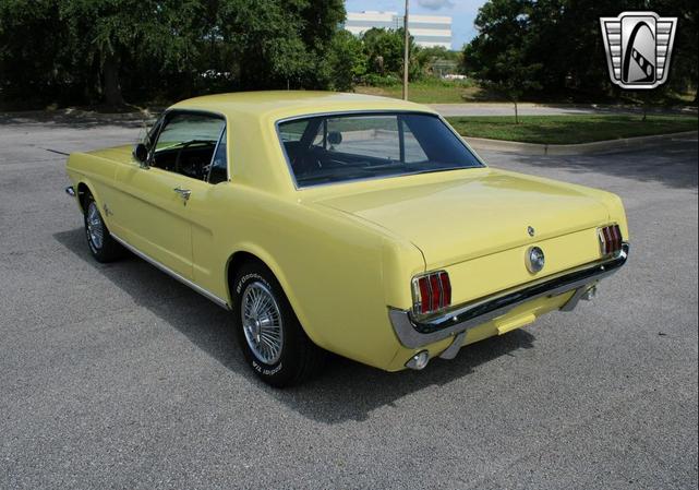 Photo of 1966 Yellow Ford Mustang